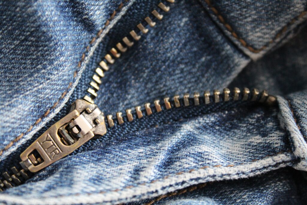 A zipper closure in a pair of jeans