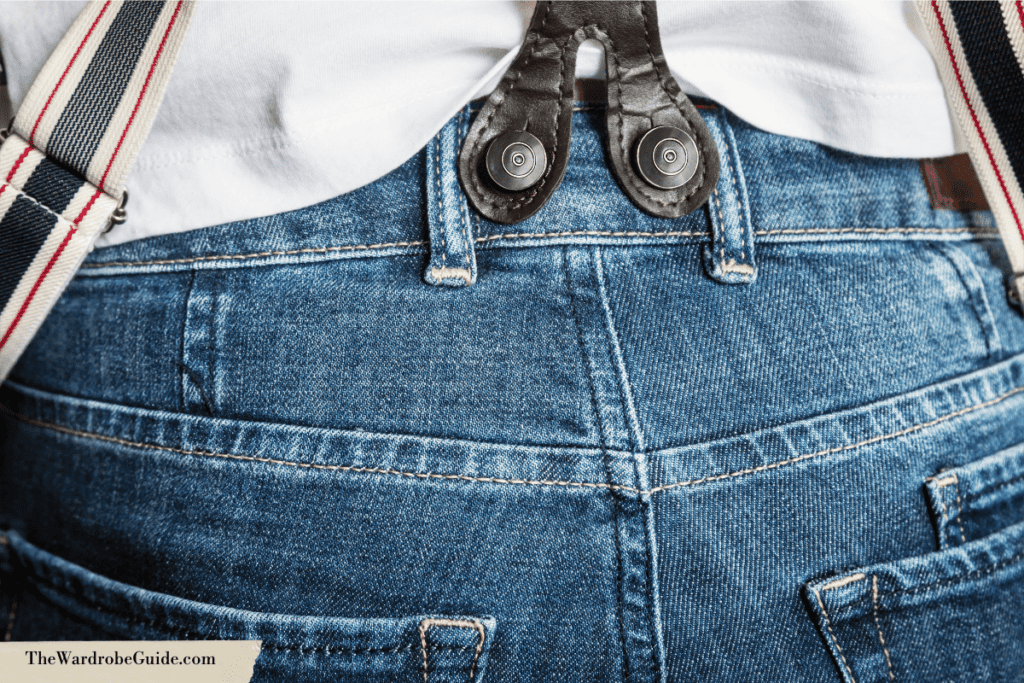 Decorative suspender buttons on jeans