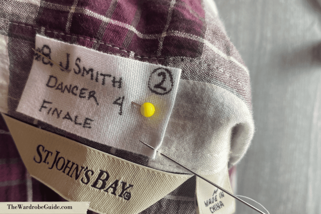 A detailed shot of the stitches used to label theatrical costumes